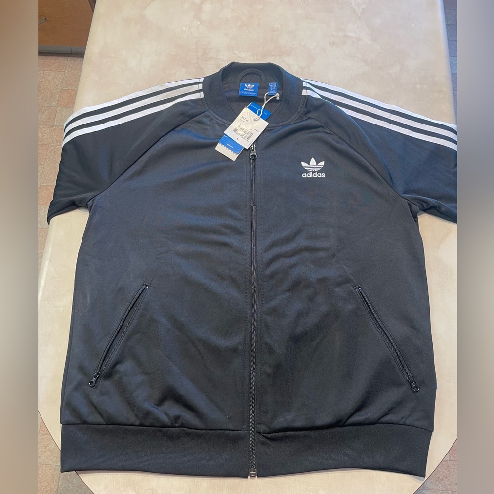 Women’s Adodas full zip track jacket NWT